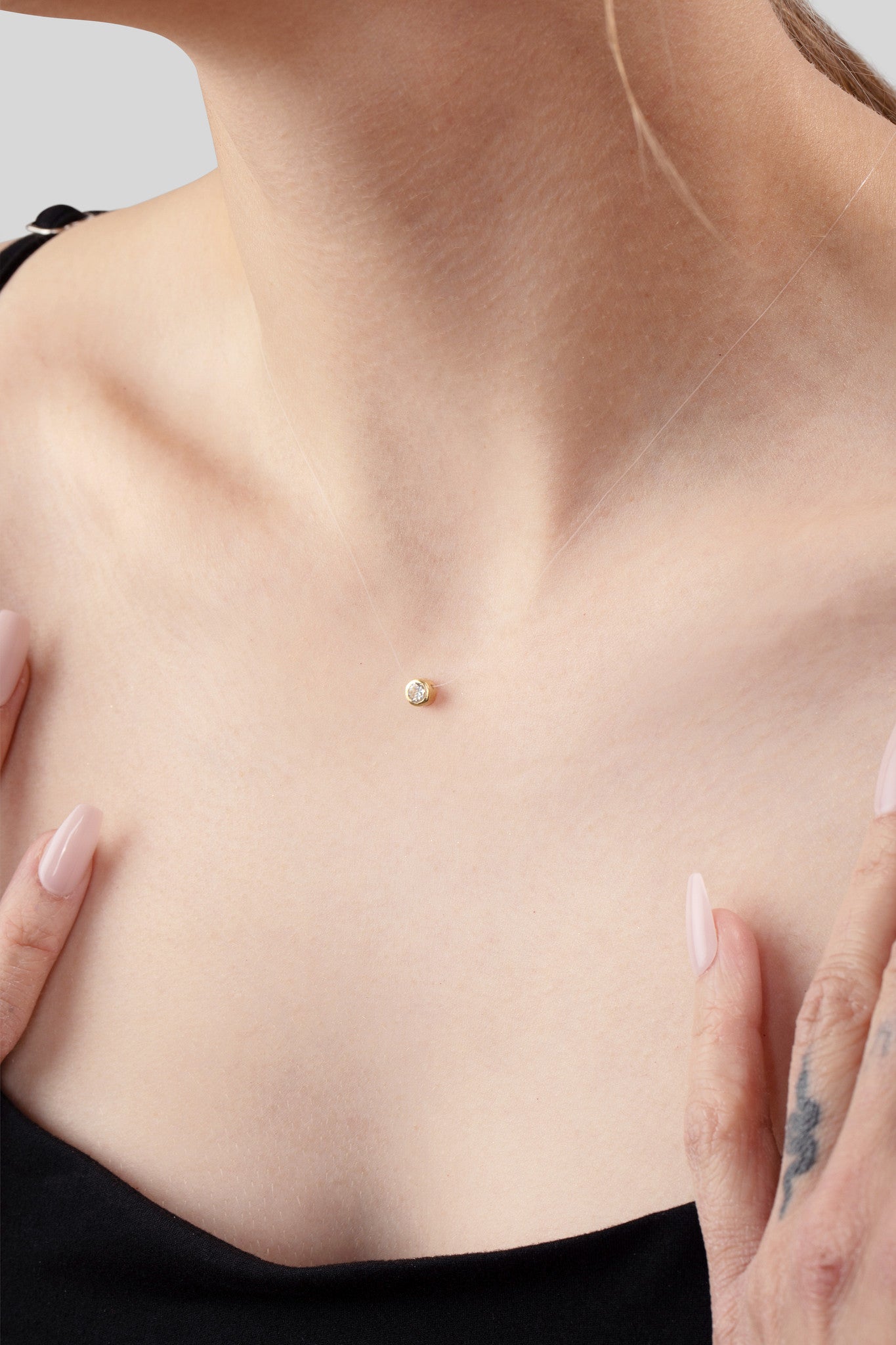 0.25 CT FLOATING DIAMOND NECKLACE - 14K Gold